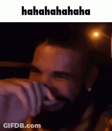 Man With Beard Laughing Covering Face GIF