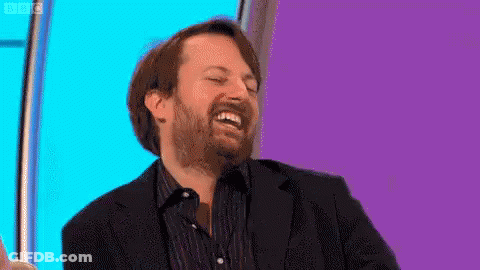 Man With Beard Laughing In Suit And Shirt GIF