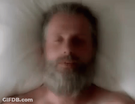 Man With Beard Laying In Bed GIF