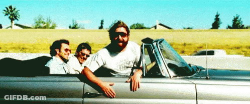 Man With Beard Leaning Out Of Convertible Car GIF