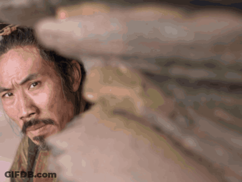 Man With Beard Looking At Camera GIF