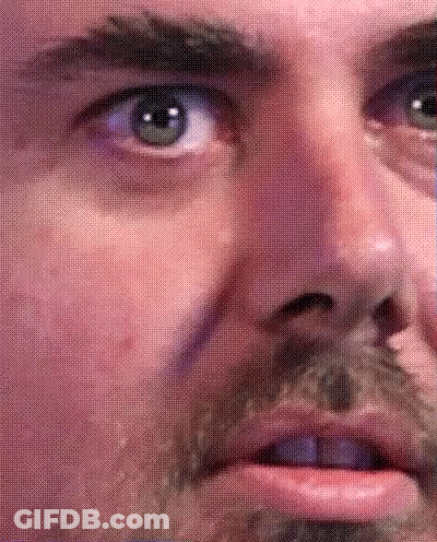 Man With Beard Looking At Camera GIF