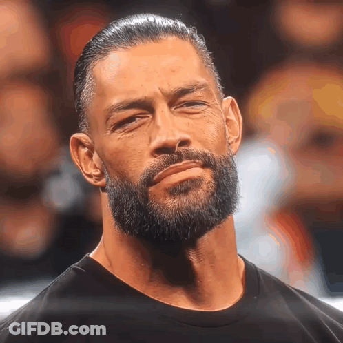 Man With Beard Looking At Camera GIF