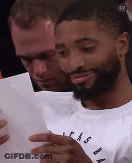 Man With Beard Looking At Paper GIF