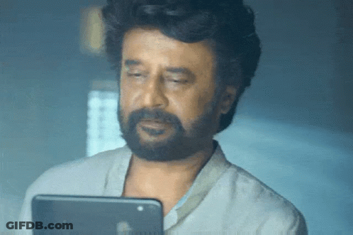 Man With Beard Looking At Tablet Computer GIF