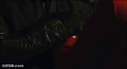 Man With Beard Looking At Woman In Red Shirt GIF