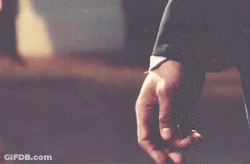 Man With Beard Looking Down GIF