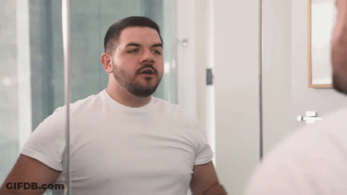 Man With Beard Looking In Mirror GIF