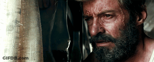 Man With Beard Looking Out Window GIF