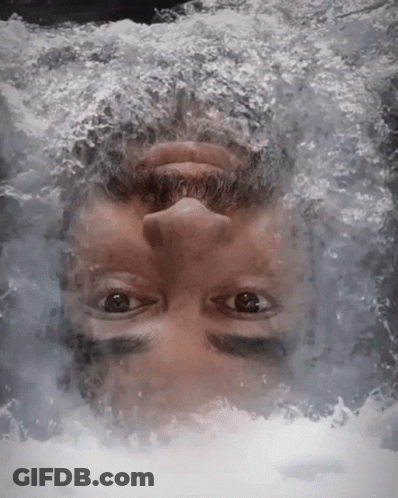 Man With Beard Looking Up In Water GIF