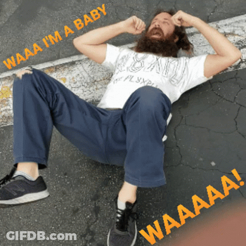 Man With Beard Lying Down Waaa Waaa I Am A Baby GIF