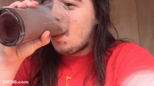 Man With Beard Lying On Chair With Ketchup On Face Saying What's That GIF