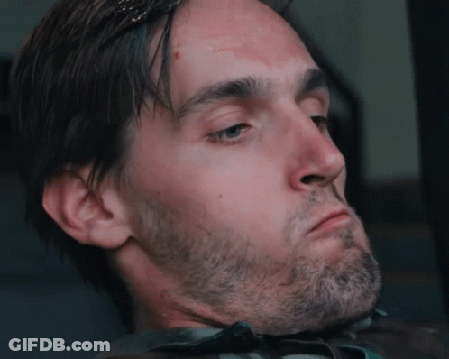 Man With Beard Making Face With Eyes Closed GIF