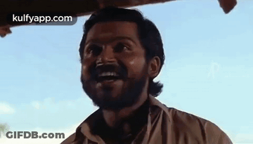 Man With Beard Making Funny Face And Waving GIF