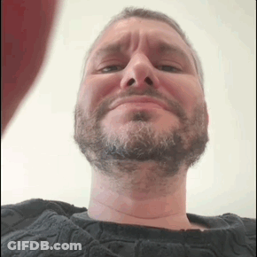 Man With Beard Making Funny Face In Black Sweater GIF