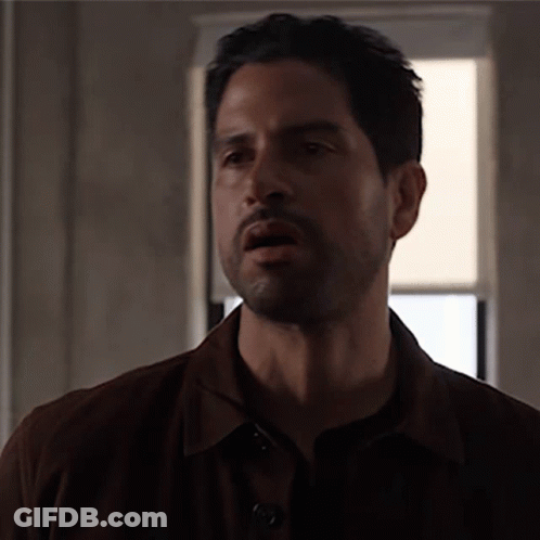 Man With Beard Making Funny Face In Front Of Window GIF