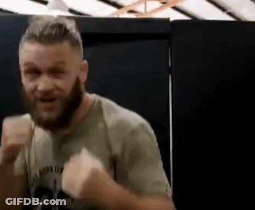Man With Beard Making Funny Face In Gym GIF