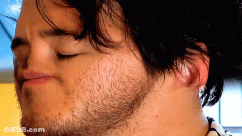 Man With Beard Making Funny Face With Eyes Closed GIF