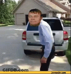 Man With Beard Next To Silver SUV GIF