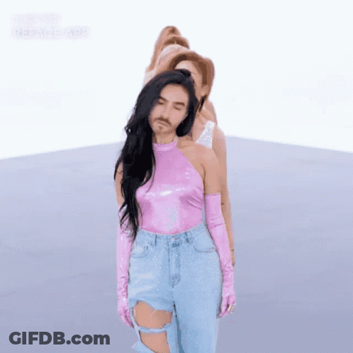 Man With Beard Next To Woman In Pink GIF