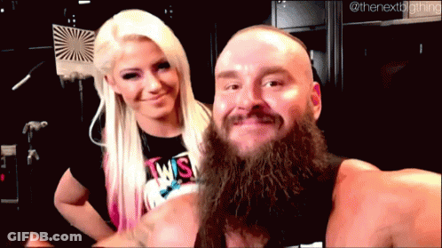 Man With Beard Next To Woman In Twist Shirt GIF