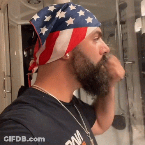 Man With Beard Playing Guitar In A Band With Drummer GIF