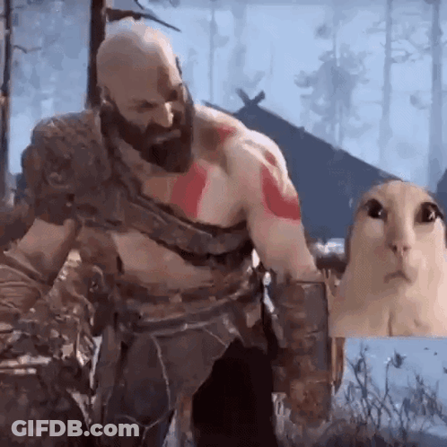 Man With Beard Playing Video Game With Cat Behind Him GIF