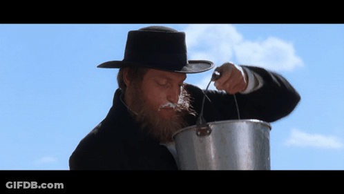 Man With Beard Pouring Into Pot GIF