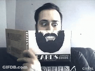 Man With Beard Reading Beard Guide GIF