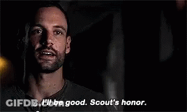 Man With Beard Saluting In Dark Saying I'll Be Good GIF