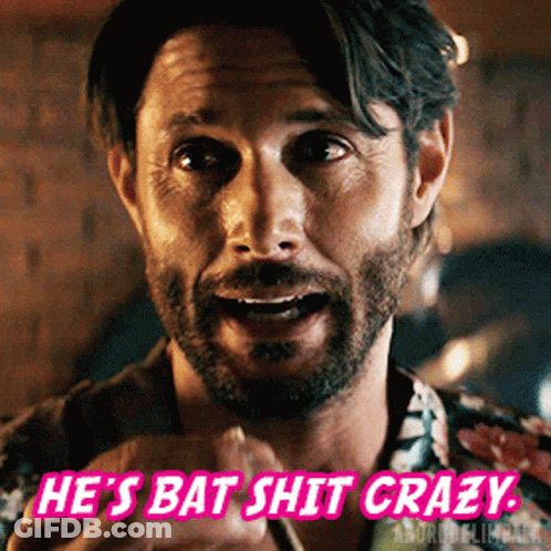 Man With Beard Saying He's Bat Shit Crazy In Pink Letters GIF