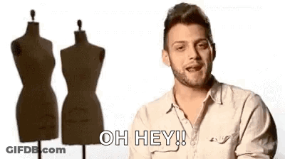 Man With Beard Saying Oh Hey Beside Mannequins GIF