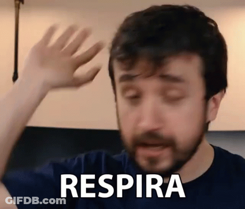 Man With Beard Saying Respira With Hand GIF