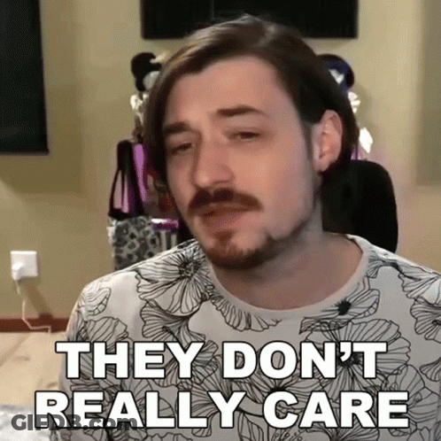 Man With Beard Saying They Don't Really Care GIF