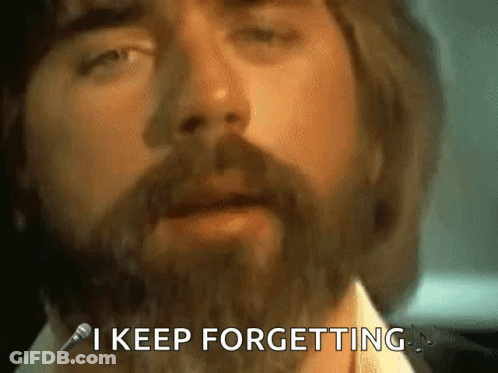 Man With Beard Says I Keep Forgetting At Microphone GIF