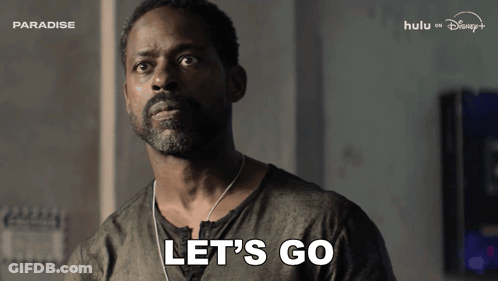 Man With Beard Says Let's Go Watching Paradise On Hulu GIF