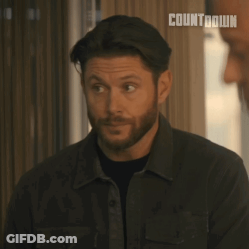 Man With Beard Says Please Continue In Front Of Window GIF