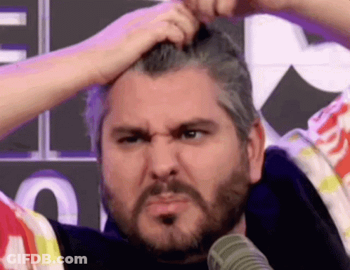 Man With Beard Scratching Head Making Funny Face GIF