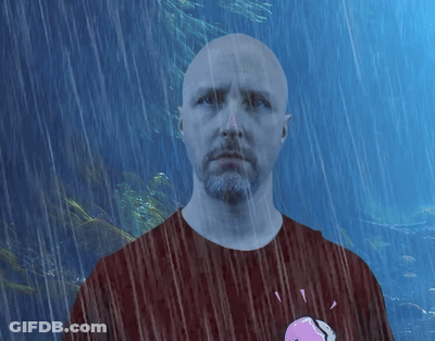 Man With Beard Shaving Head In Mirror GIF