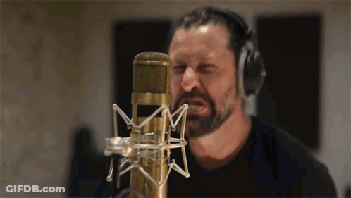 Man With Beard Singing Into Microphone GIF