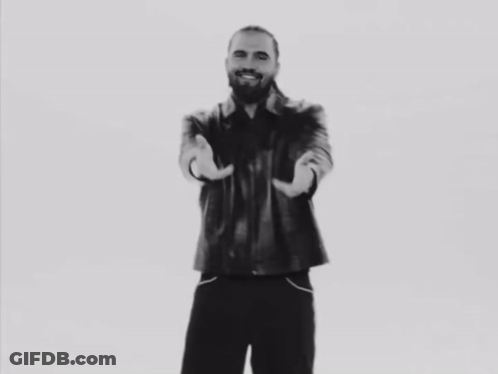 Man With Beard Singing Into Microphone GIF