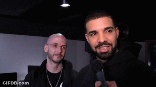 Man With Beard Singing Into Microphone GIF