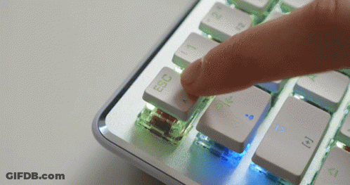 Man With Beard Sitting At Desk In Office GIF