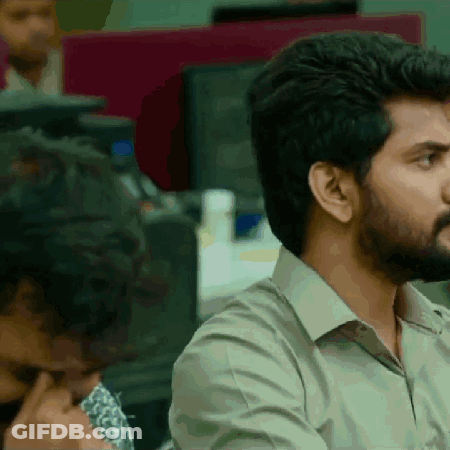 Man With Beard Sitting At Desk GIF