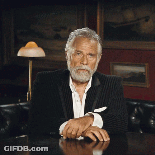 Man With Beard Sitting At Table GIF