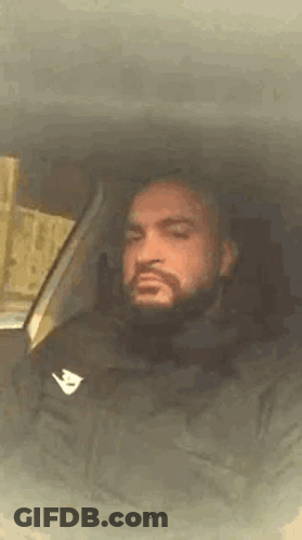 Man With Beard Sitting In Car GIF