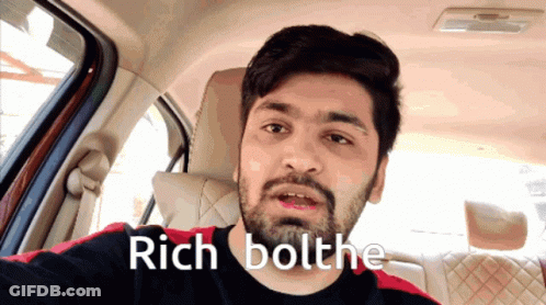 Man With Beard Sitting In Car Says Rich Bolthe GIF