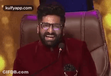 Man With Beard Sitting In Chair GIF