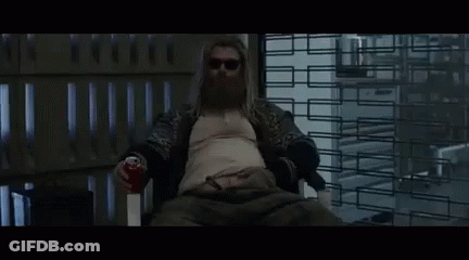 Man With Beard Sitting In Chair Holding Soda Can GIF