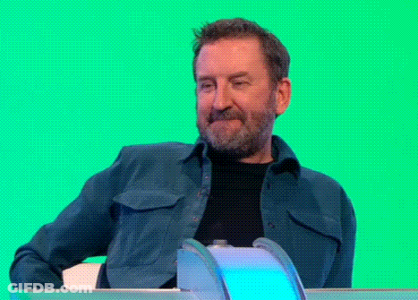 Man With Beard Sitting In Front Of Green Screen GIF